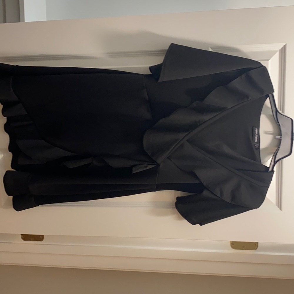 Black cross front low cut dress with ruffles